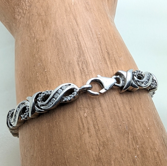 Genuine Diamond and Sterling Infinity Bracelet - Picture 3 of 7